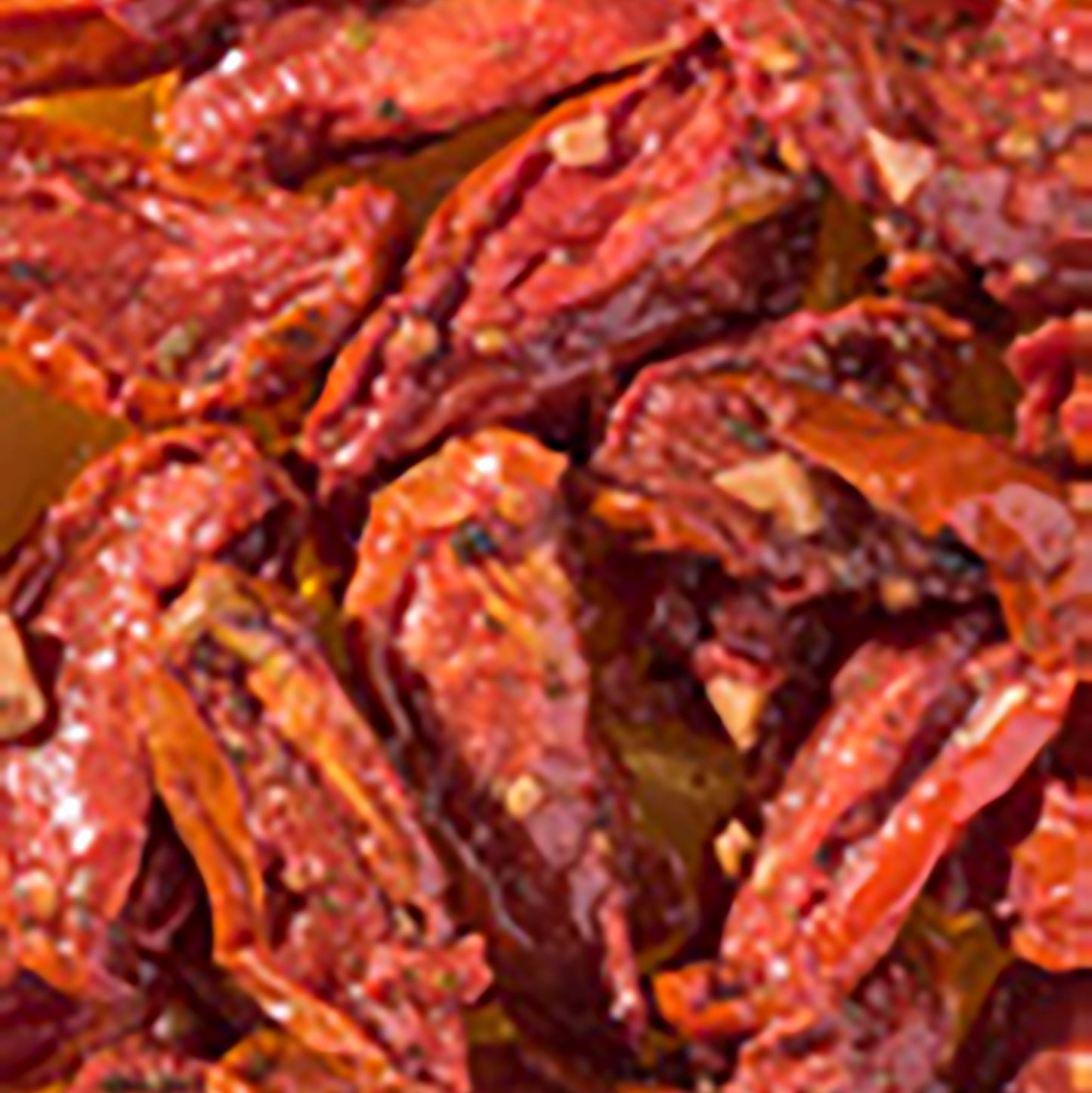 sferturi-de-rosii-uscate-la-soare-in-ulei-cu-ierburi-aromatice-si-usturoi_10